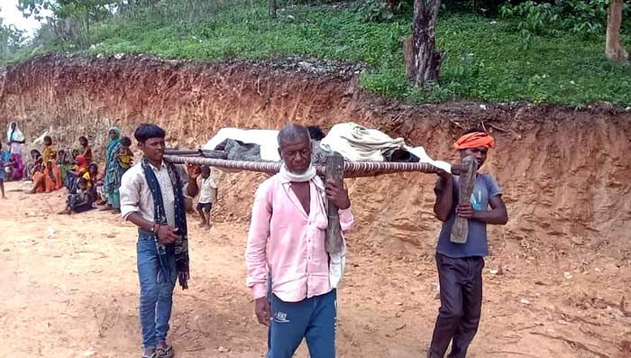 Tribal woman's body carried on cot for post-mortem in MP's Singrauli