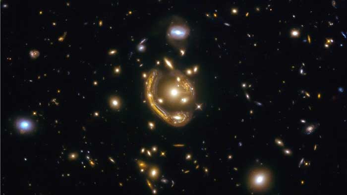 Hubble's new 'molten Einstein ring' image prompts new research