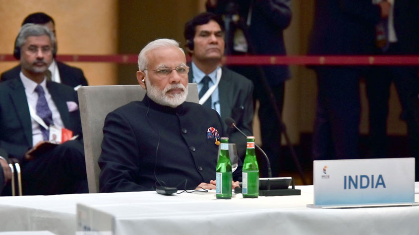 Modi, Xi meet, hold 'conversation' at BRICS leaders' meeting