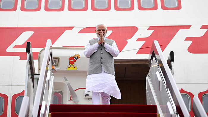 'Howdy Houston!' says PM as he arrives to packed itinerary