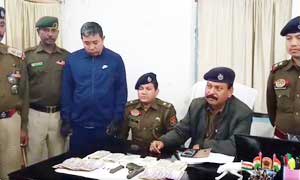 Bangladeshi held in Tripura with gun, smartphones, currencies of 2 nations