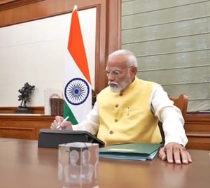 PM Modi signs first file for farmers' welfare
